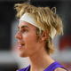 Illustration for article titled Weakling Justin Bieber Apologizes to Perceived Strong Man Tom Cruise